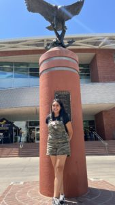 Mei stands in front of Cal State LA Golden Eagle statue