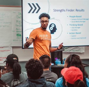 peerforward leader guides students through strengths finder exercise