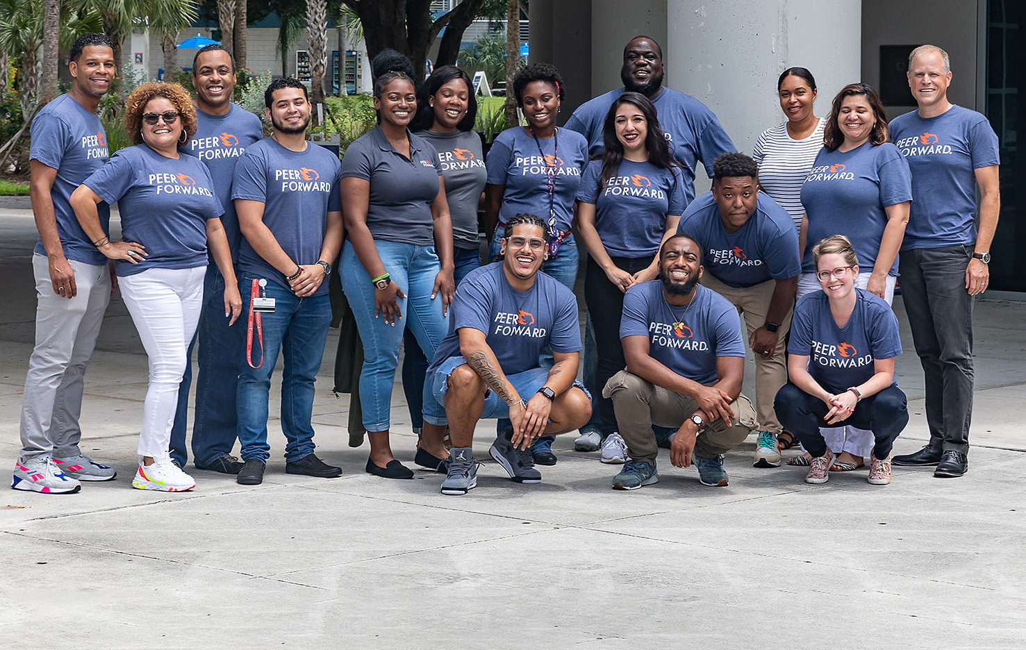 group of happy peerforward team members