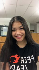a high school girl in a PeerForward shirt