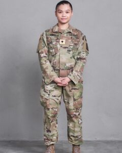 young woman in military fatigues 