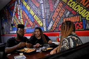patrons dine at tk surf and turf kitchen